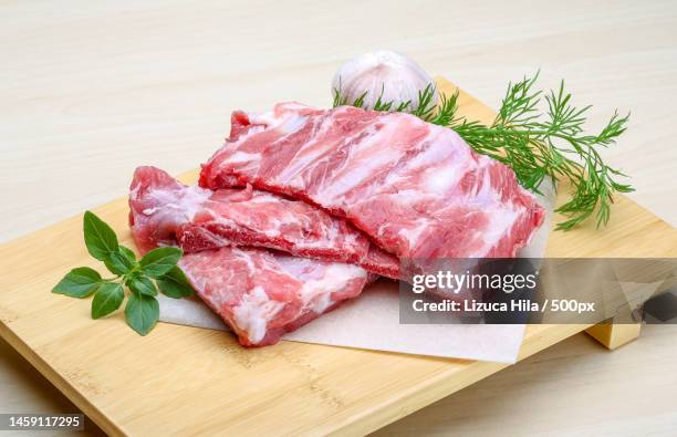 high angle view of raw meat on cutting board,romania - chuck stock pictures, royalty-free photos & images