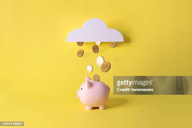 financial freedom conceptual piggy bank with gold coins still life. - financial freedom stock pictures, royalty-free photos & images