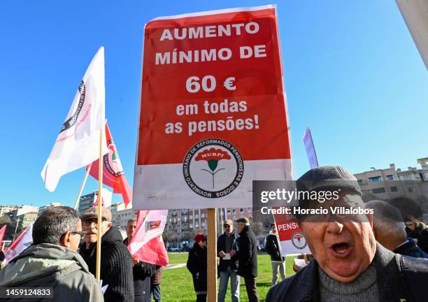 Pensioners hold posters while gathering to protest in Alameda Dom Afonso Henriques against the rising cost of living on January 24 in Lisbon,...