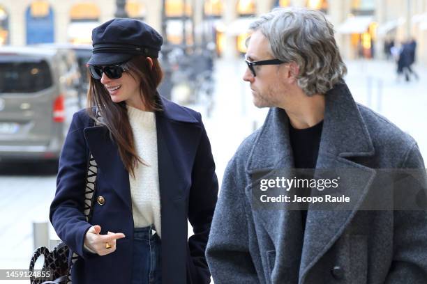 Anne Hathaway and Adam Shulman are seen during Paris Fashion Week - Haute Couture Spring Summer on January 24, 2023 in Paris, France.