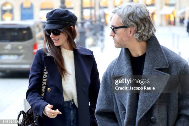 Anne Hathaway and Adam Shulman are seen during Paris Fashion Week - Haute Couture Spring Summer on January 24, 2023 in Paris, France.