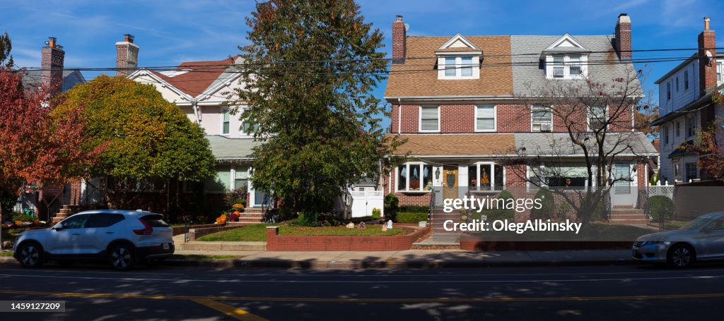 Street with Residential Houses and Bright Blue Clear Sky, Brooklyn, New York.