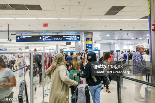 Miami, Florida, Miami International Airport MIA terminal, Transportation Security Administration TSA, busy, crowded security check point.