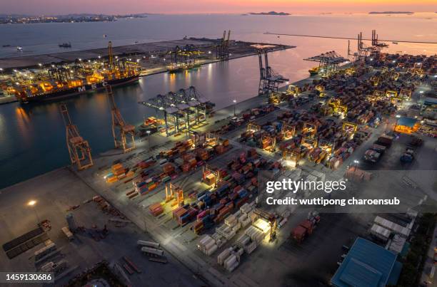 Dock In Port A Large Cargo Ship Is Docking At The Port To Load The Goods Container ...