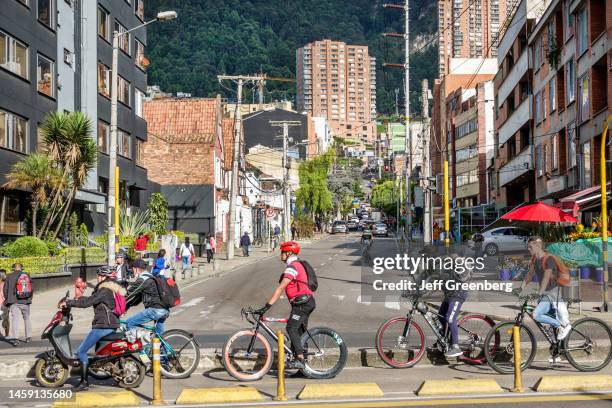 Bogota, Colombia, Chapinero Norte Avenida, Carrera 7, group of cyclists lined up in the bike lane waiting for traffic.