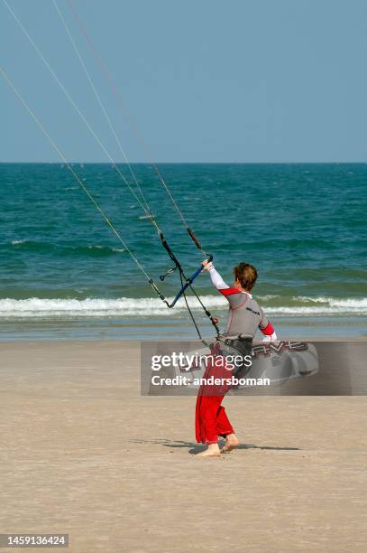 kite surfers in thailand - hua hin stock pictures, royalty-free photos & images