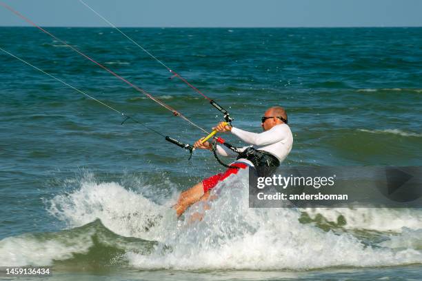 kite surfers in thailand - hua hin stock pictures, royalty-free photos & images