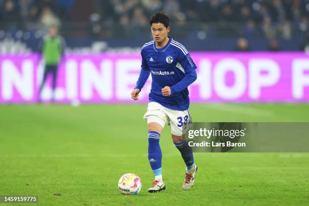Soichiro Kozuki of FC Schalke 04 runs with the ball during the Bundesliga match between FC Schalke 04 and RB Leipzig at Veltins-Arena on January 24,...