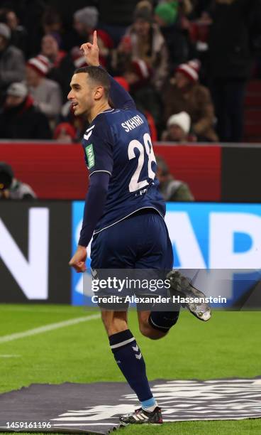 Ellyes Skhiri of 1.FC Koln celebrates after scoring the team's first goal during the Bundesliga match between FC Bayern München and 1. FC Köln at...