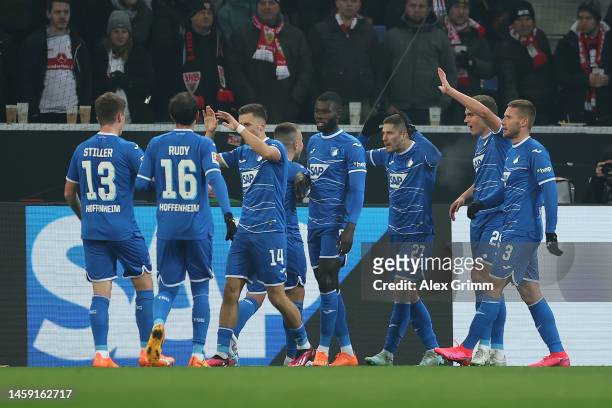Andrej Kramaric of TSG Hoffenheim celebrates after scoring the team's first goal with teammates during the Bundesliga match between TSG Hoffenheim...