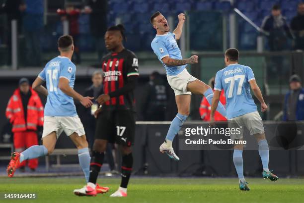 Sergej Milinkovic-Savic of SS Lazio celebrates after scoring the team's first goal during the Serie A match between SS Lazio and AC Milan at Stadio...