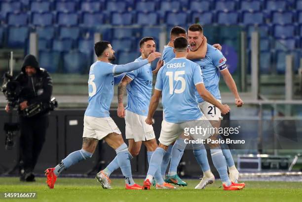 Sergej Milinkovic-Savic of SS Lazio celebrates with teammates after scoring the team's first goal during the Serie A match between SS Lazio and AC...