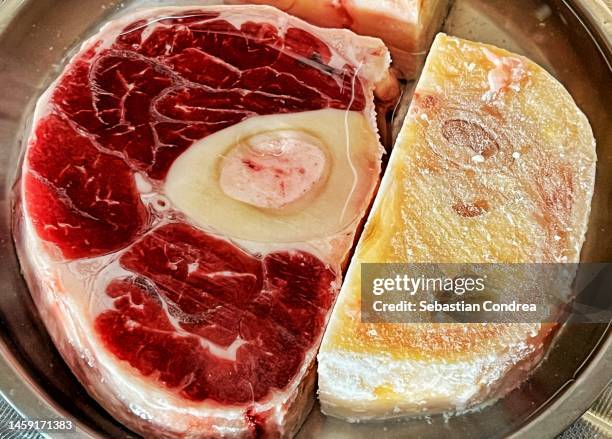 preparing osso buco with beef beef shanks - bone marrow stock pictures, royalty-free photos & images