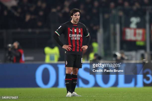 Sandro Tonali of AC Milan looks dejected after Mattia Zaccagni of SS Lazio scores the team's second goal during the Serie A match between SS Lazio...