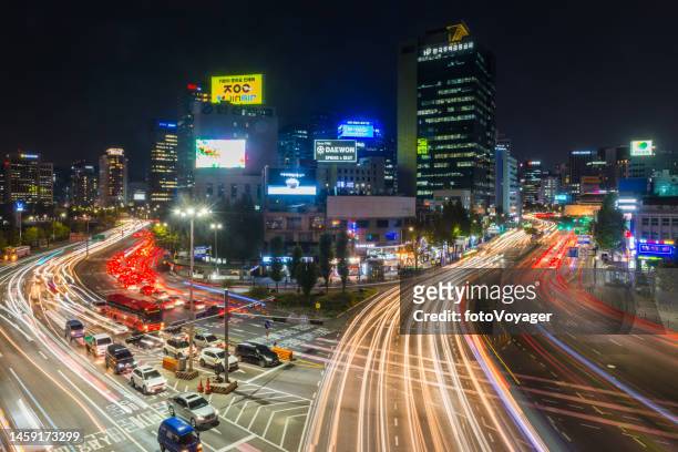 seoul rush hour traffic light trails neon night cityscape korea - seoul street stock pictures, royalty-free photos & images