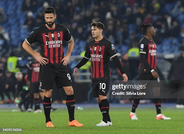 Olivier Giroud of AC Milan and teammate Brahim Diaz look dejected during the Serie A match between SS Lazio and AC MIlan at Stadio Olimpico on...