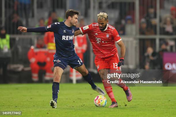 Eric Maxim Choupo-Moting of Bayern Munich battles for possession with Jonas Hector of 1.FC Koln during the Bundesliga match between FC Bayern München...