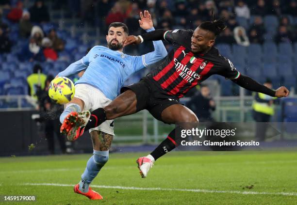 Elseid Hysaj of SS Lazio challenges Rafael Leao of AC Milan during the Serie A match between SS Lazio and AC Milan at Stadio Olimpico on January 24,...