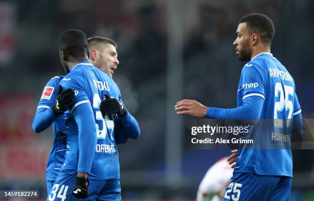 Andrej Kramaric of TSG Hoffenheim celebrates after scoring the team's second goal with teammates Stanley Nsoki and Kevin Akpoguma during the...