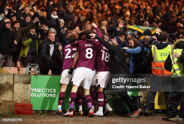 Nathaniel Mendez-Laing of Derby County celebrates with teammates and fans after scoring the team's second goal during the Sky Bet League One match...