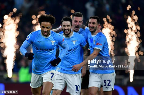 Felipe Anderson of SS Lazio celebrates scoring his team's fourth goal with his team-mates during the Serie A match between SS Lazio and AC MIlan at...
