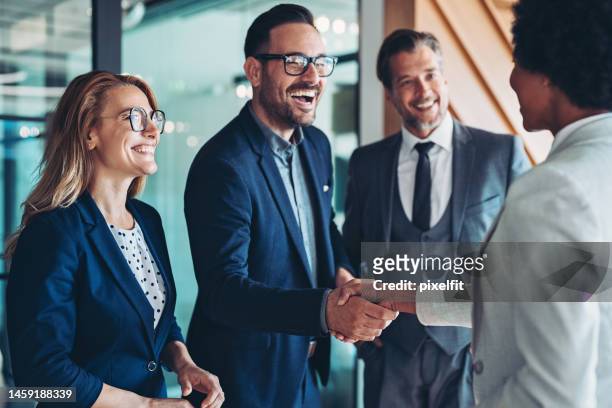 finding new partners - business introduction stock pictures, royalty-free photos & images