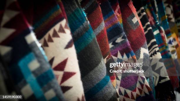 close-up of assorted native american textiles hanging side by side - north american tribal culture 個照片及圖片檔