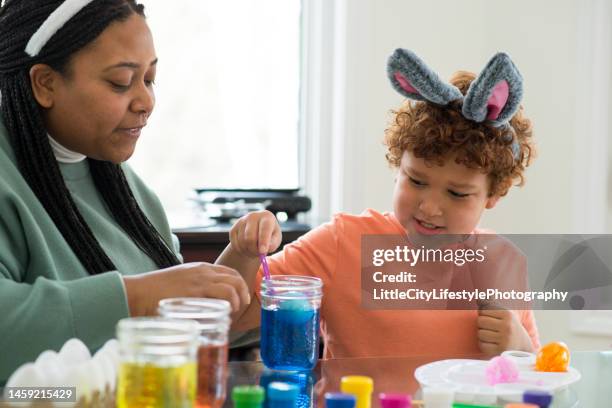 dip dyeing easter eggs - dip dye stock pictures, royalty-free photos & images