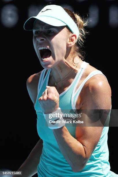 Magda Linette of Poland celebrates winning the first set during the Quarterfinal singles match against Karolina Pliskova of the Czech Republic during...