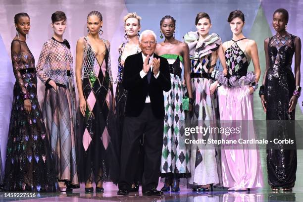 Fashion designer Giorgio Armani poses with models on the runway during the Giorgio Armani Prive Haute Couture Spring Summer 2023 show as part of...