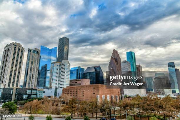 skyline of downtown houston texas - houston tx stock pictures, royalty-free photos & images