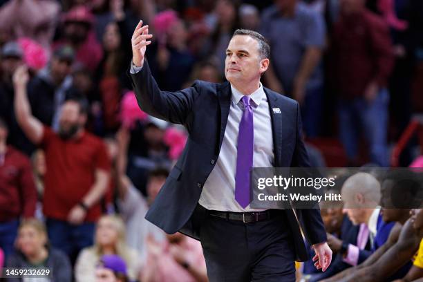 Head Coach Matt McMahon of the LSU Tigers directs his team in the second during a game against the Arkansas Razorbacks at Bud Walton Arena on January...