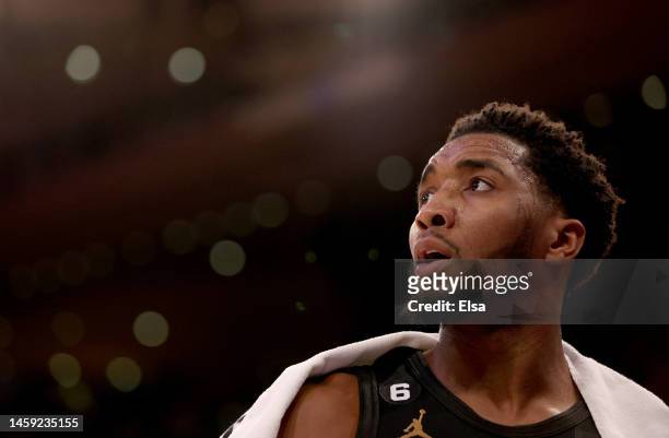 Donovan Mitchell of the Cleveland Cavaliers looks on from the bench in the second quarter against the New York Knicks at Madison Square Garden on...