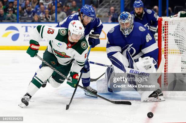 Andrei Vasilevskiy of the Tampa Bay Lightning stops a shot from Sam Steel of the Minnesota Wild in the third period during a game at Amalie Arena on...