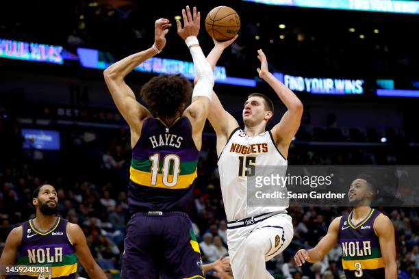 Nikola Jokic of the Denver Nuggets shoots over Jaxson Hayes of the New Orleans Pelicans during the third quarter of an NBA game at Smoothie King...