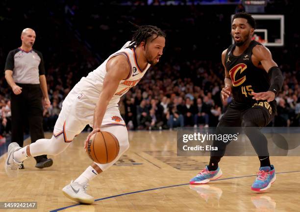 Jalen Brunson of the New York Knicks drives past Donovan Mitchell of the Cleveland Cavaliers in the third quarter at Madison Square Garden on January...