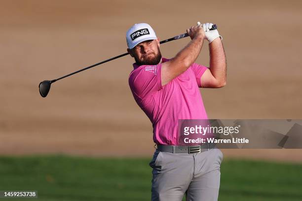 Tyrell Hatton of England plays their second shot on the 3rd hole during the Pro-Am prior to the Hero Dubai Desert Classic at Emirates Golf Club on...