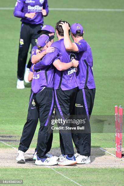 Hurricanes players celebrate the win during the Men's Big Bash League match between the Hobart Hurricanes and the Brisbane Heat at University of...