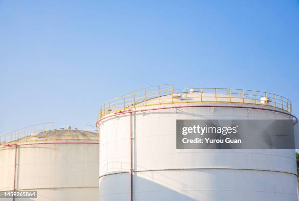 oil depot and storage tank. - benzintank stock-fotos und bilder