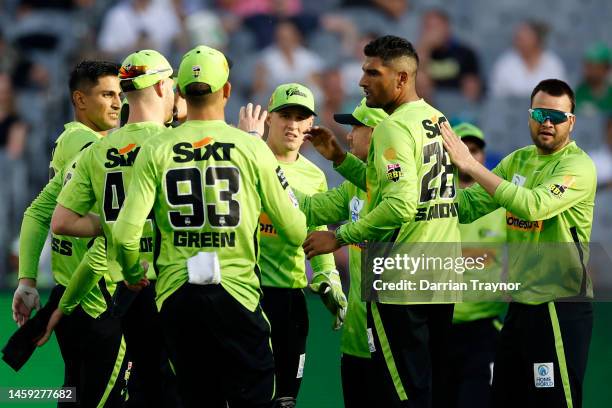 Gurinder Sandu of the Thunder celebrates a the wicket of Joe Clarke of the Stars during the Men's Big Bash League match between the Melbourne Stars...