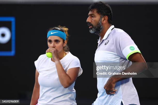 Sania Mirza of India and Rohan Bopanna of India converse in the Mixed Doubles Semifinals against Neal Skupski of Great Britain and Desirae Krawczyk...