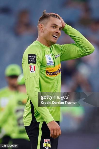 Chris Green of the Thunder celebrates the wicket of Hilton Cartwright of the Stars during the Men's Big Bash League match between the Melbourne Stars...