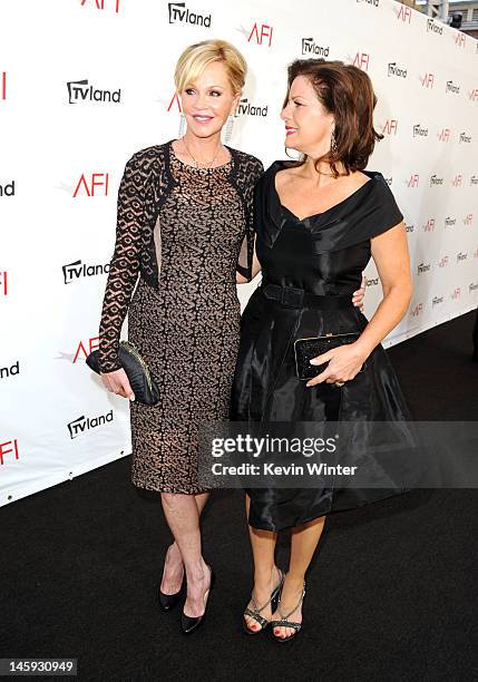 Actors Melanie Griffith and Marcia Gay Harden arrive at the 40th AFI Life Achievement Award honoring Shirley MacLaine held at Sony Pictures Studios...
