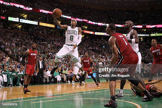 Rajon Rondo of the Boston Celtics drives for a shot attempt in the first half against the Miami Heat in Game Six of the Eastern Conference Finals in...