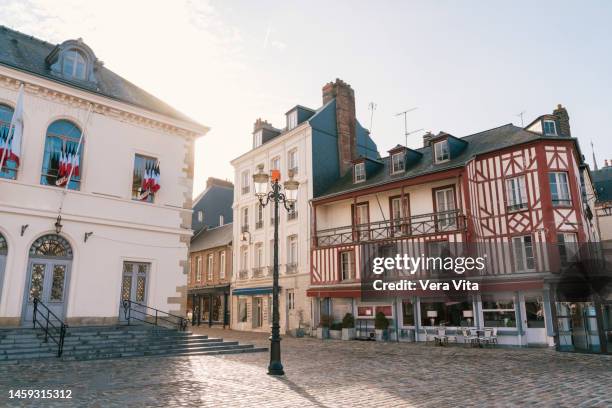 city scenery view of traditional french houses with timbered french architecture in urban street - 諾曼第 個照片及圖片檔