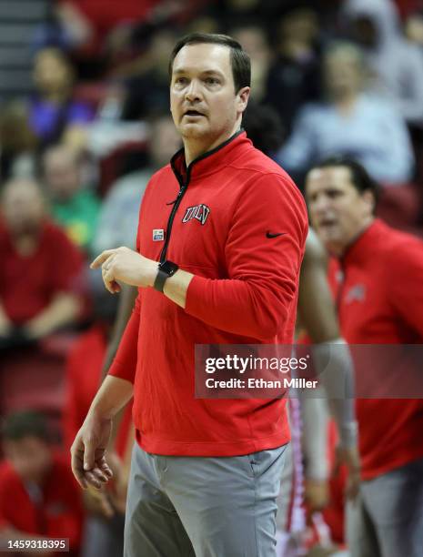 Head coach Kevin Kruger of the UNLV Rebels looks on in the second half of a game against the Wyoming Cowboys at the Thomas & Mack Center on January...