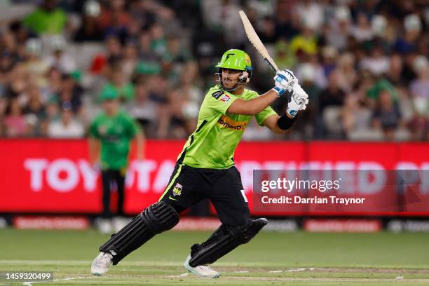 Oliver Davies of the Thunder bats during the Men's Big Bash League match between the Melbourne Stars and the Sydney Thunder at Melbourne Cricket...