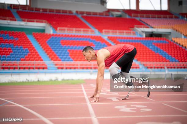 disabled man athlete training with leg prosthesis. - paraplegic race stock pictures, royalty-free photos & images