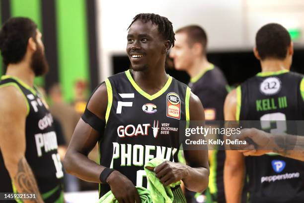 Junior Madut of the Phoenix celebrates the win during the round 17 NBL match between South East Melbourne Phoenix and Cairns Taipans at State...