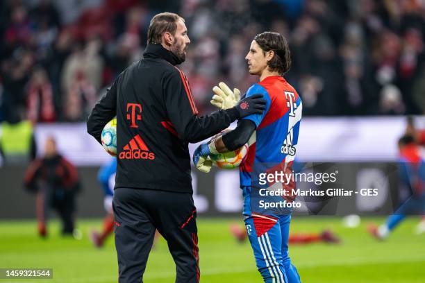 Goalkeeping coach Tom Starke of Bayern talks to Yann Sommer prior to the Bundesliga match between FC Bayern München and 1. FC Köln at Allianz Arena...